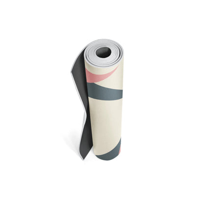 Rolled-up yoga mat with colorful design on a white background