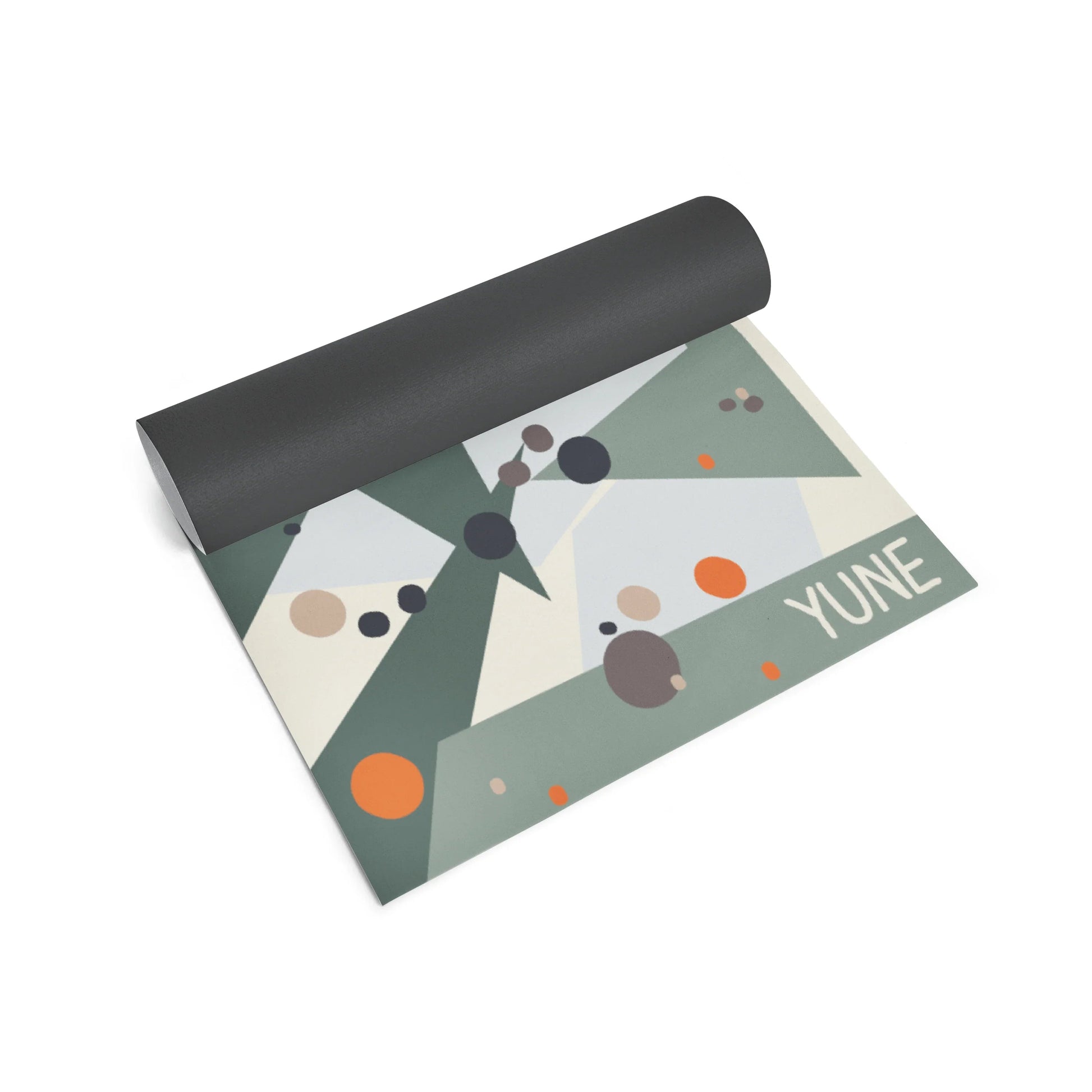 Yoga mat with geometric pattern and 'YUNE' branding on a white background