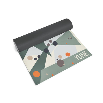 Yoga mat with geometric pattern and 'YUNE' branding on a white background
