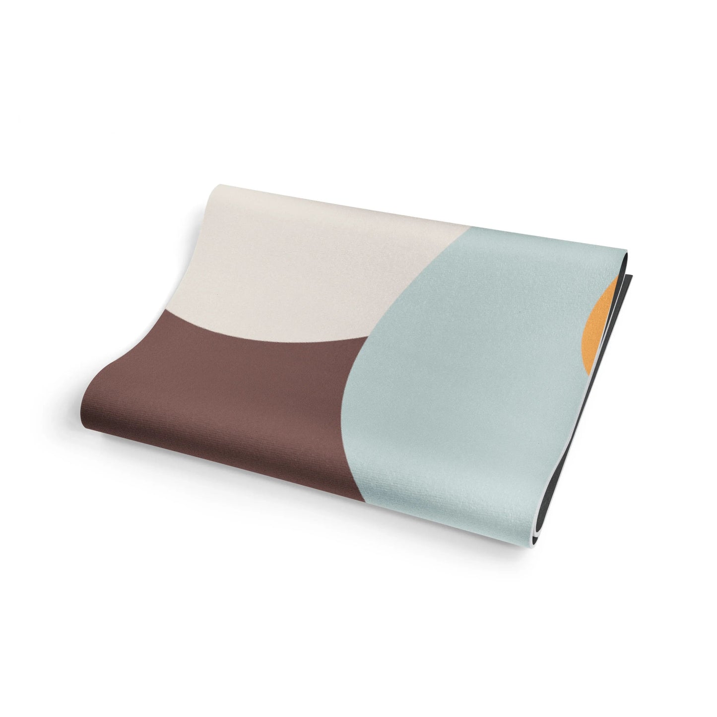 Folded fabric with three color sections on a white background