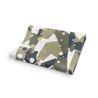 Folded fabric with geometric pattern on a white background