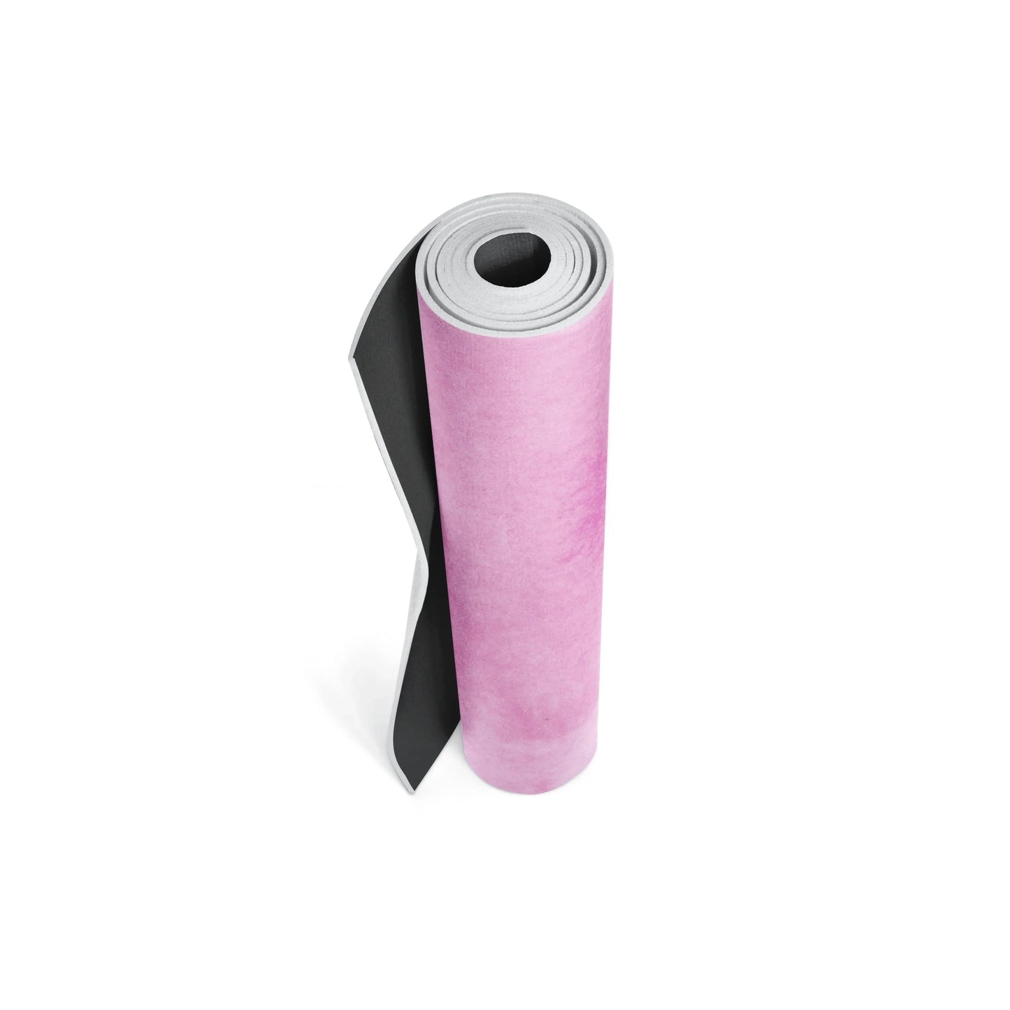 Pink yoga mat with black backing on a white background