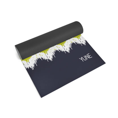 Yoga mat with a design and 'YUNE' branding on a white background